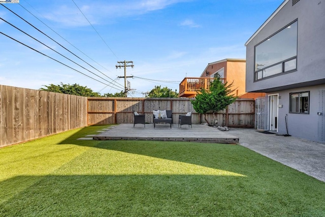 view of yard featuring a wooden deck