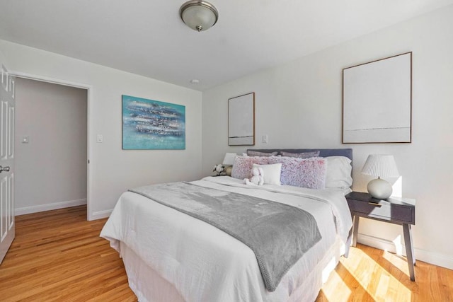 bedroom featuring light hardwood / wood-style floors