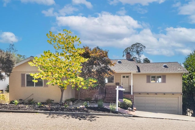 view of front of house with a garage