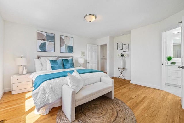 bedroom featuring light wood-type flooring