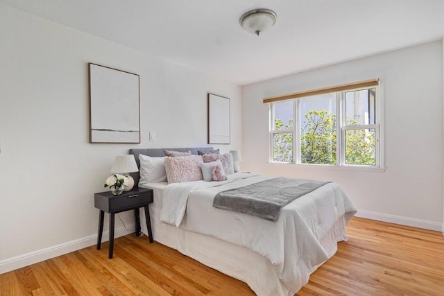 bedroom featuring light hardwood / wood-style floors