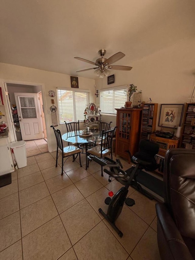 dining area featuring light tile patterned flooring and ceiling fan