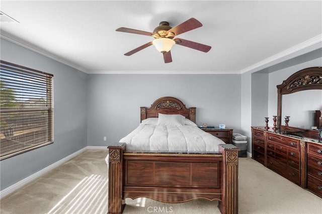 bedroom with crown molding, light colored carpet, and ceiling fan