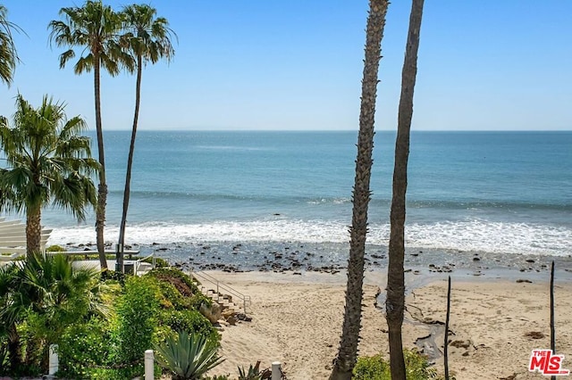 view of water feature with a beach view