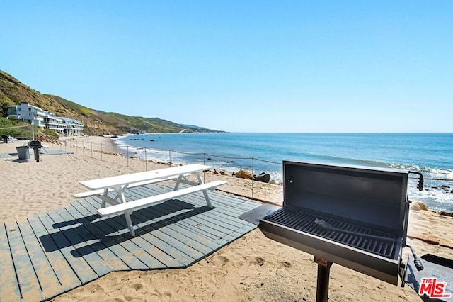 view of water feature featuring a beach view