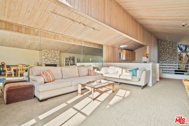 living room featuring wood ceiling, vaulted ceiling, and light colored carpet