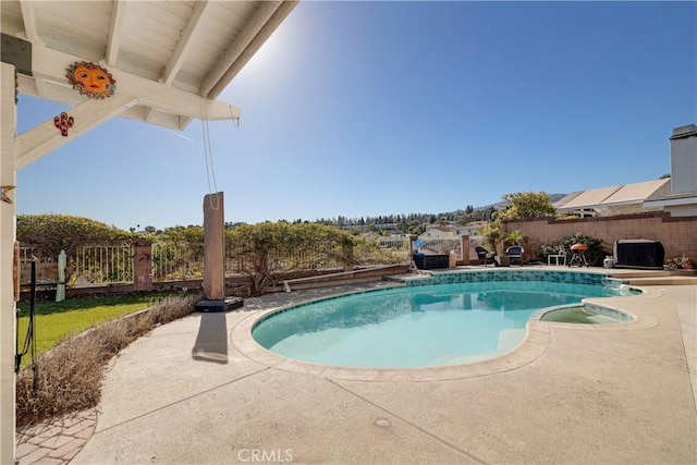 view of swimming pool with a patio