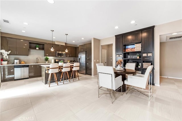 dining area with light tile patterned floors