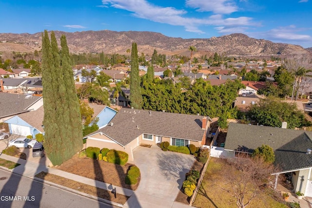 drone / aerial view featuring a mountain view