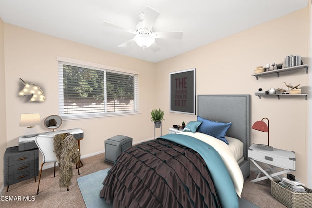 carpeted bedroom featuring ceiling fan