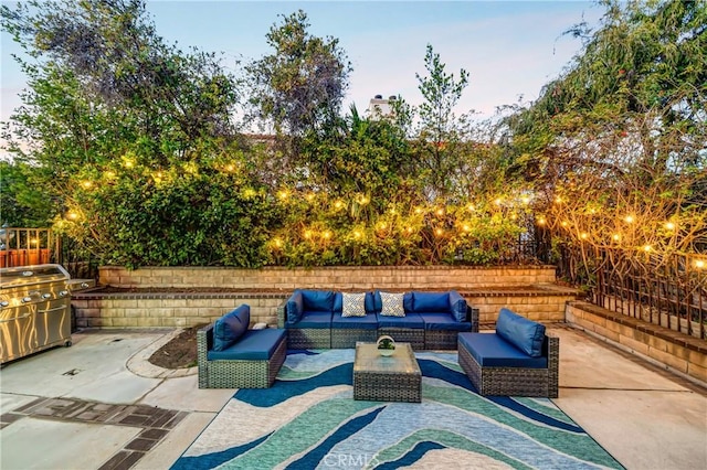 view of patio featuring grilling area and outdoor lounge area