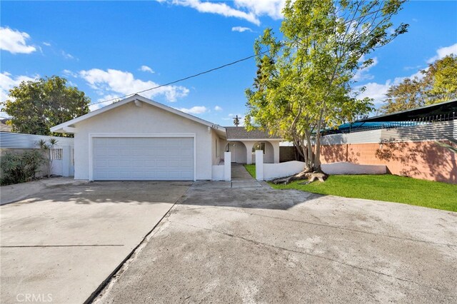 ranch-style home with a garage