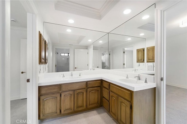 bathroom featuring vanity and ornamental molding