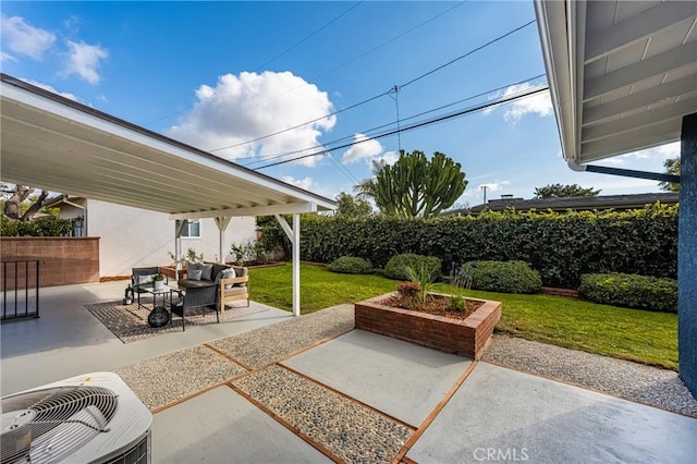 view of patio with central AC