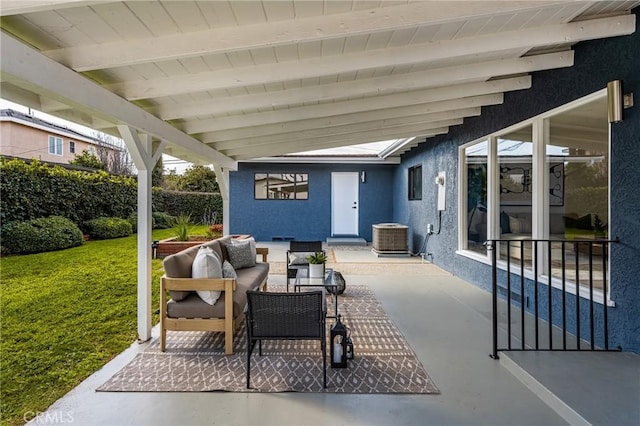 view of patio / terrace with central AC and an outdoor living space