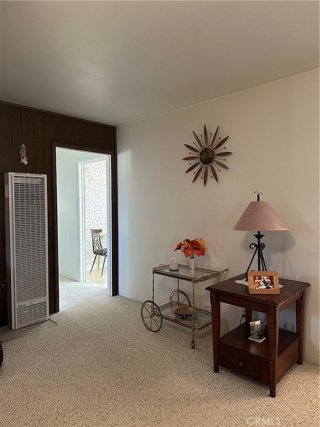 hallway featuring light colored carpet