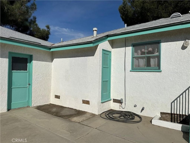 view of home's exterior with a patio area