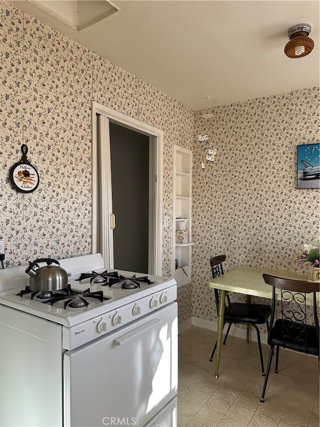 kitchen featuring white gas range oven