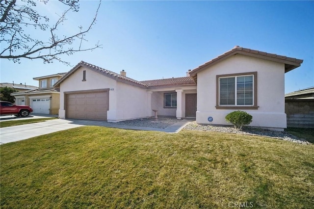 view of front of house with a garage and a front yard