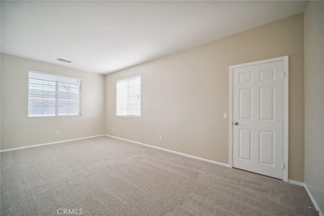 empty room featuring carpet