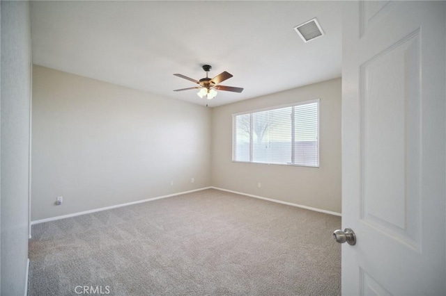 unfurnished room featuring carpet flooring and ceiling fan