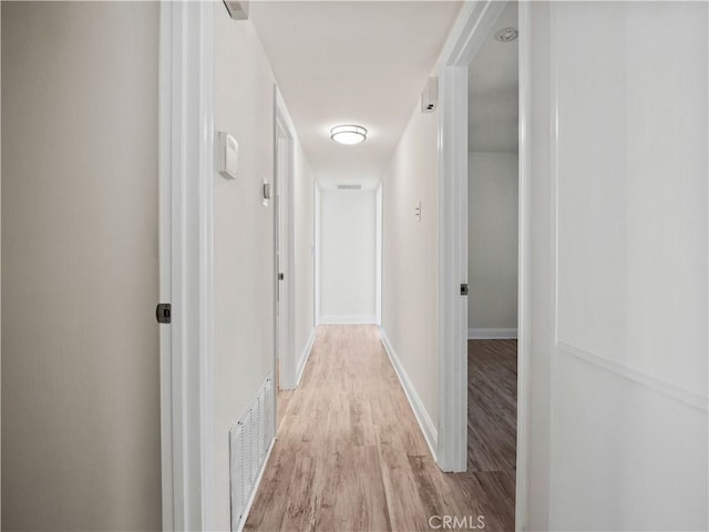 hallway featuring light hardwood / wood-style floors