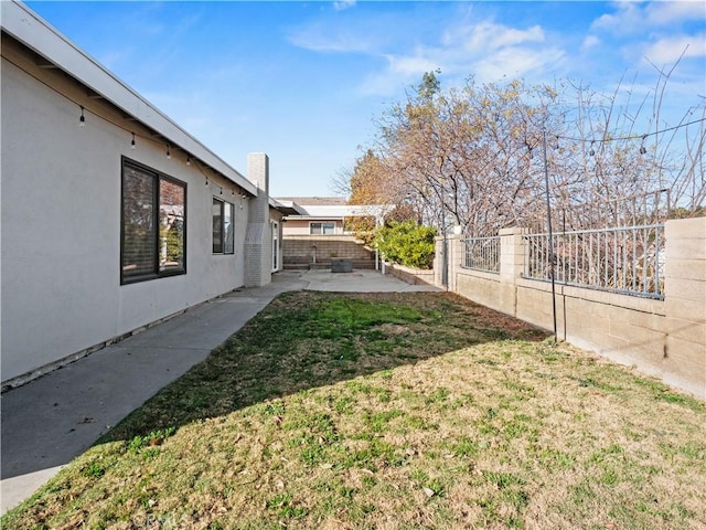 view of yard with a patio