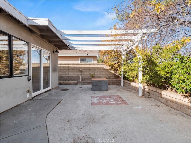 view of patio featuring a pergola