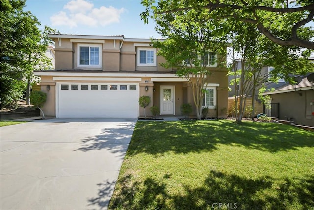 front of property with a garage and a front lawn