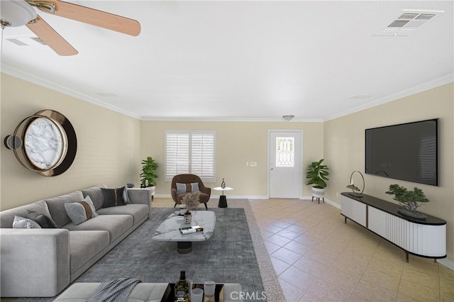 tiled living room with crown molding and ceiling fan