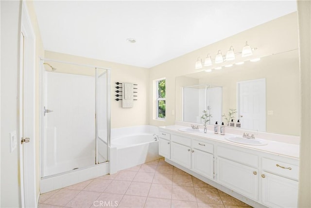 bathroom featuring vanity, tile patterned floors, and separate shower and tub