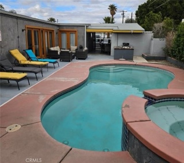 view of pool with an outdoor hangout area and a patio