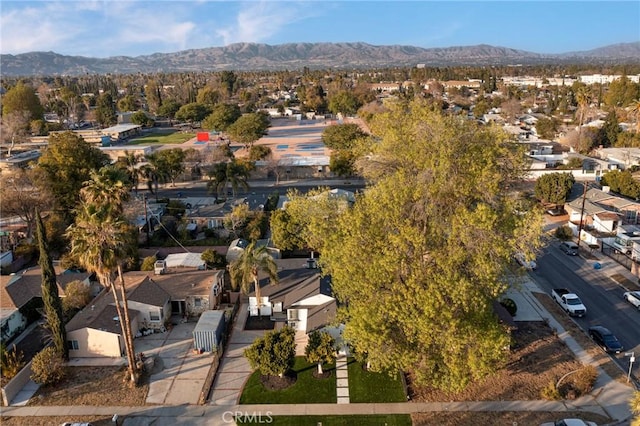 drone / aerial view featuring a mountain view