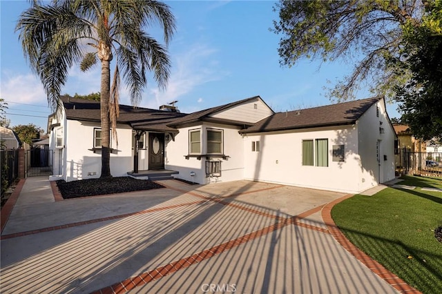 back of property with a patio area