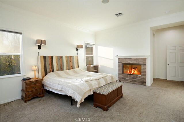16082 Citrus Grove Ct, Riverside, CA 92504 - bedroom with a fireplace, ornamental molding, carpet, and visible vents