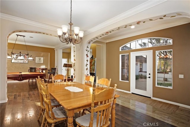 dining space with ornamental molding, dark wood-type flooring, pool table, and a chandelier