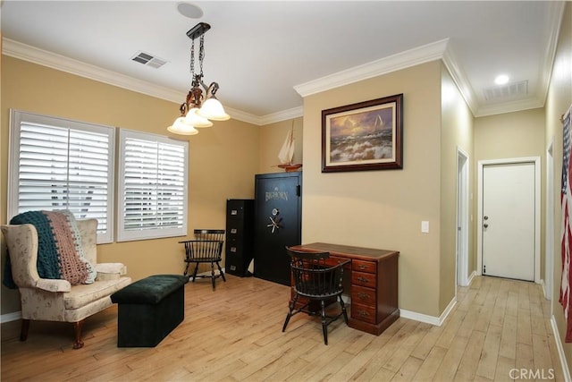 office space with ornamental molding, a chandelier, and light wood-type flooring