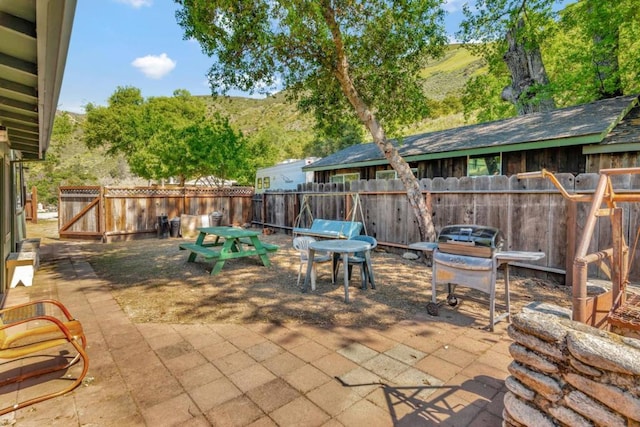 view of patio with a grill