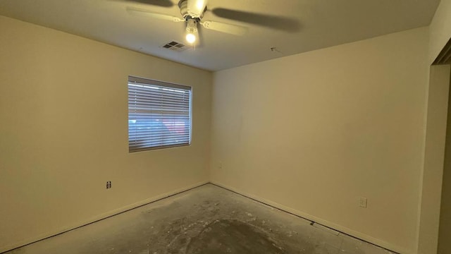 unfurnished room featuring concrete flooring and ceiling fan