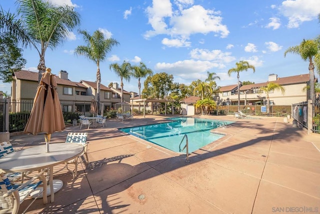 view of swimming pool featuring a patio