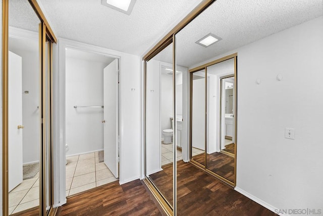 interior space featuring hardwood / wood-style floors and a textured ceiling