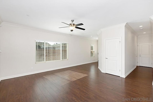 unfurnished room with dark wood-type flooring, ceiling fan, and ornamental molding