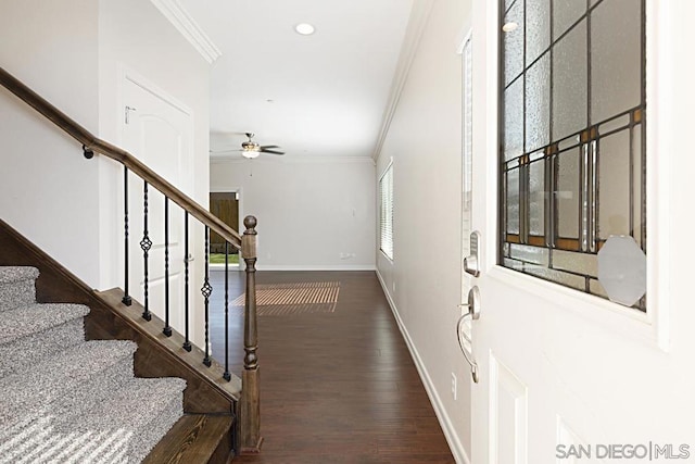 stairs featuring crown molding, wood-type flooring, and ceiling fan