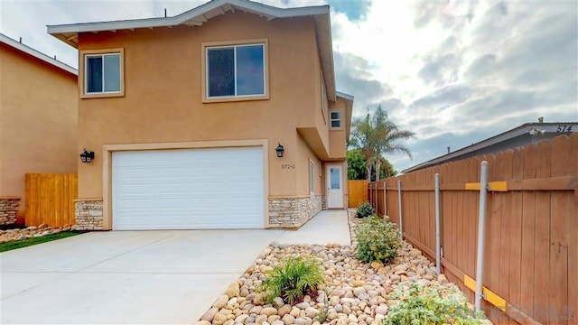 view of property exterior featuring a garage