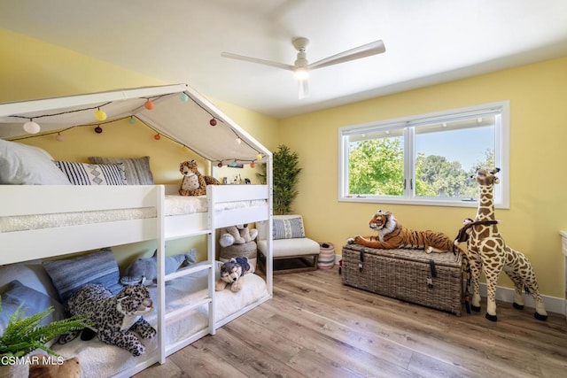 bedroom featuring ceiling fan and wood-type flooring