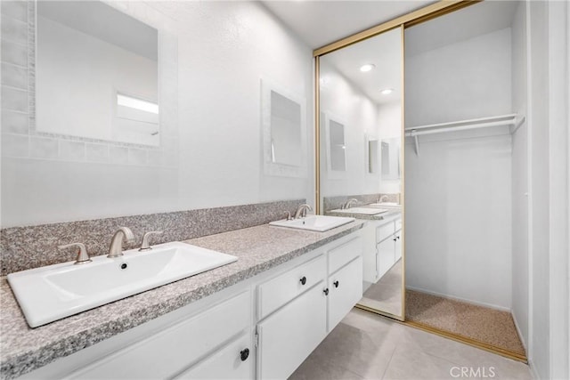 bathroom with vanity and tile patterned floors