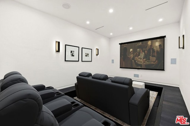 cinema featuring dark hardwood / wood-style flooring