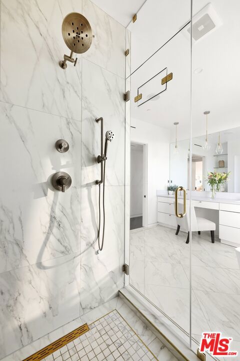 bathroom featuring walk in shower