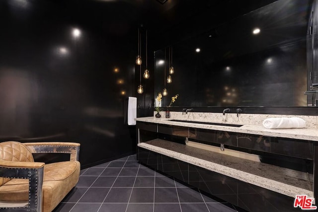 interior space with tile patterned flooring and sink