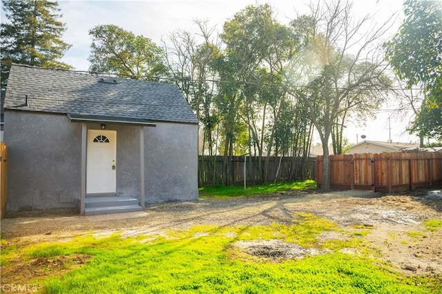 view of yard with a storage shed